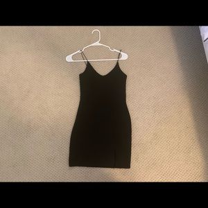 black bodycon dress with thigh slit